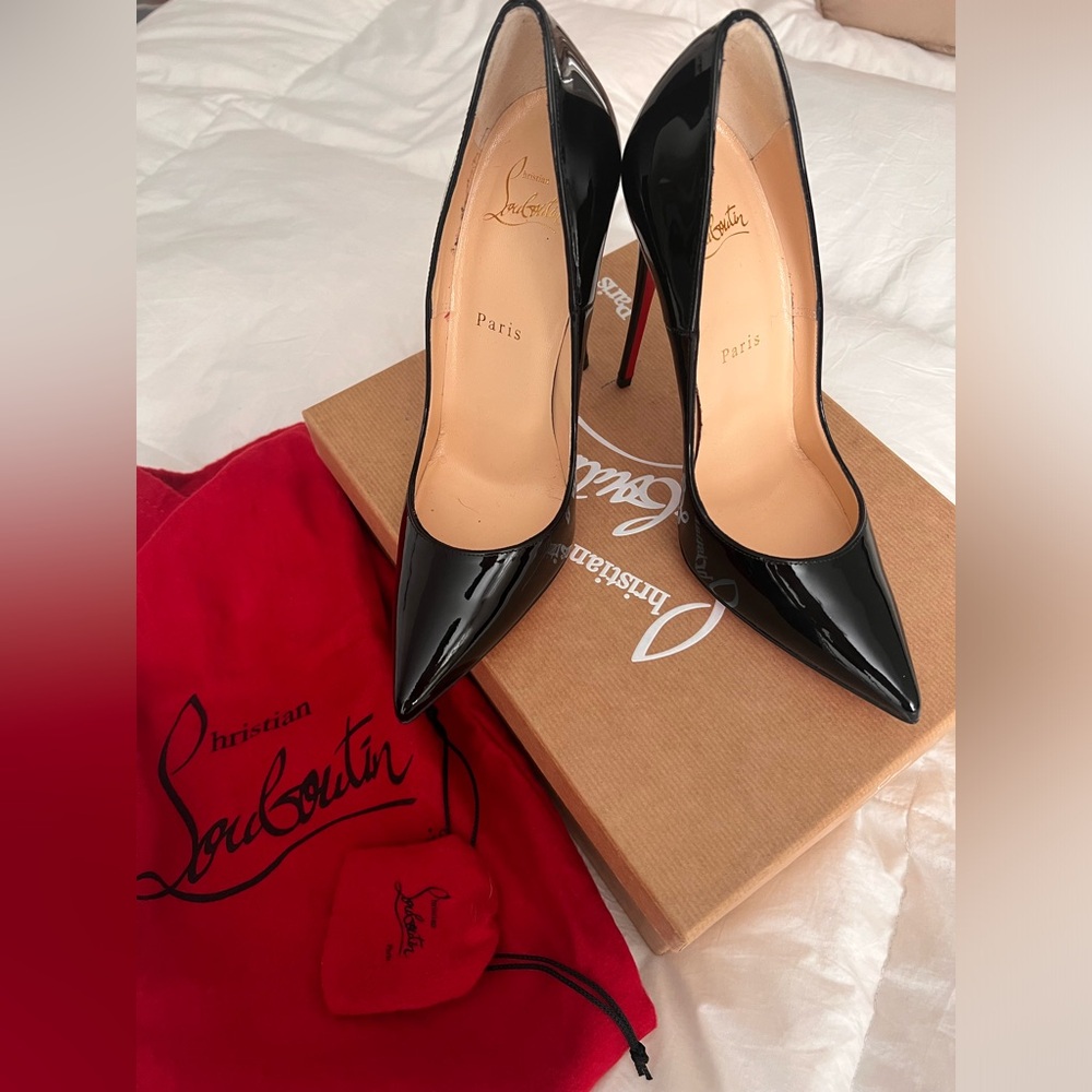Christian Louboutin
So Kate Patent Pointed-Toe Red Sole Pump